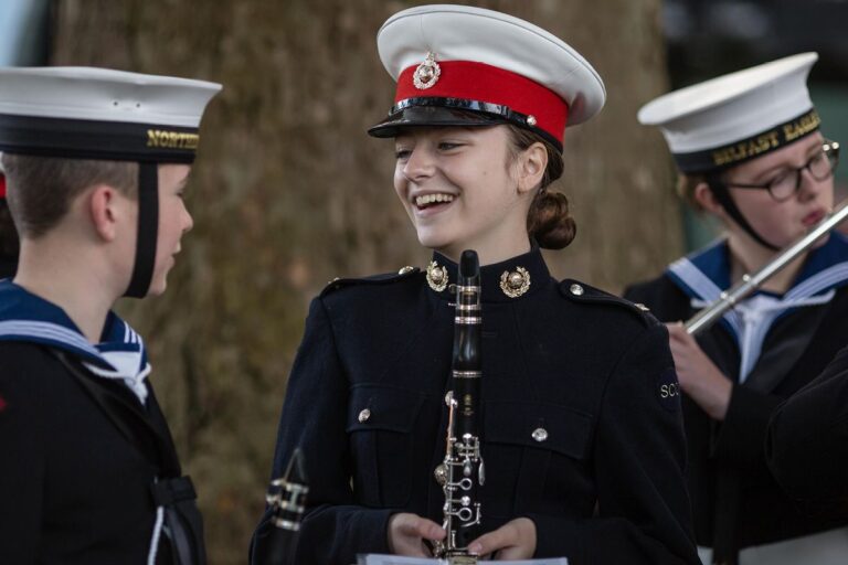 Boys and girls playing music for Sea Cadet Corps