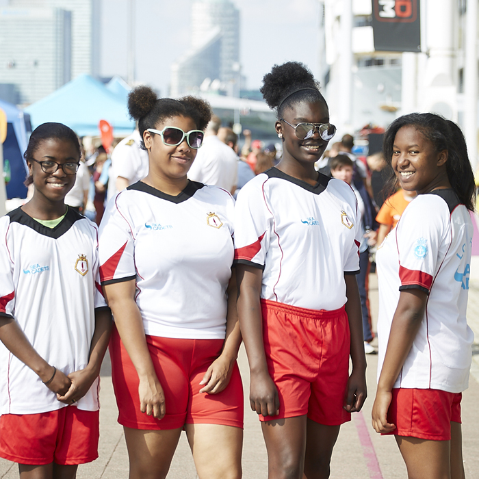 Four girls in Sea Cadets sports activity gear